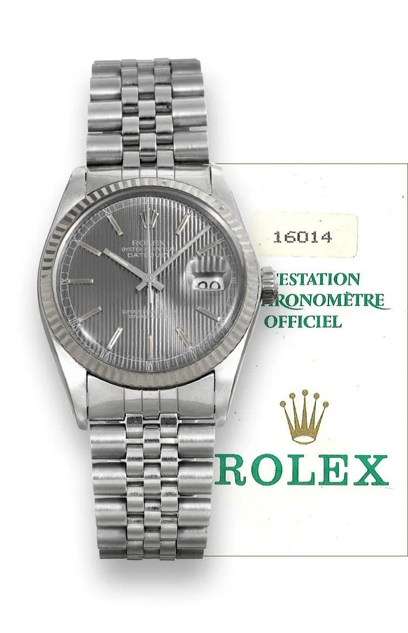 Rolex steel and White Gold, Ref. 16014 Rolex, 'Oyster Perpetual, Datejust, Superlative Chronometer Officially Certified', case No. R391145, Ref. 16014/16000. Sold on August, 1988. Fine, center seconds, self-winding, water-resistant, stainless steel and 18K white gold chronometer's wristwatch with date and a stainless steel Jubilee bracelet with deployant clasp. Accompanied by a guarantee (now void). To be sold without reserve
