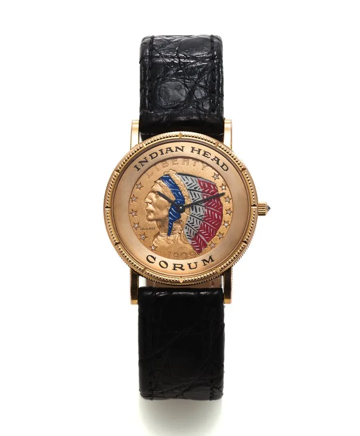 CORUM 5 DOLLAR INDIAN HEAD COIN WATCH YELLOW GOLD Corum, Coin Watch, No. 318890, case No. 476115, Made in the 1980's. Fine, thin, 18K yellow gold quartz wristwatch with gold plaque Corum buckle and inserted in a $5 US gold coin dated 1909.
