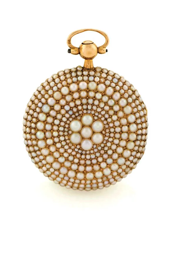 MELLY - PEARL PENDANT WATCH Frères Melly (Geneva), case No. 9400. Made circa 1830. Fine and rare, 18K gold and pearl-set lady's pendant watch.