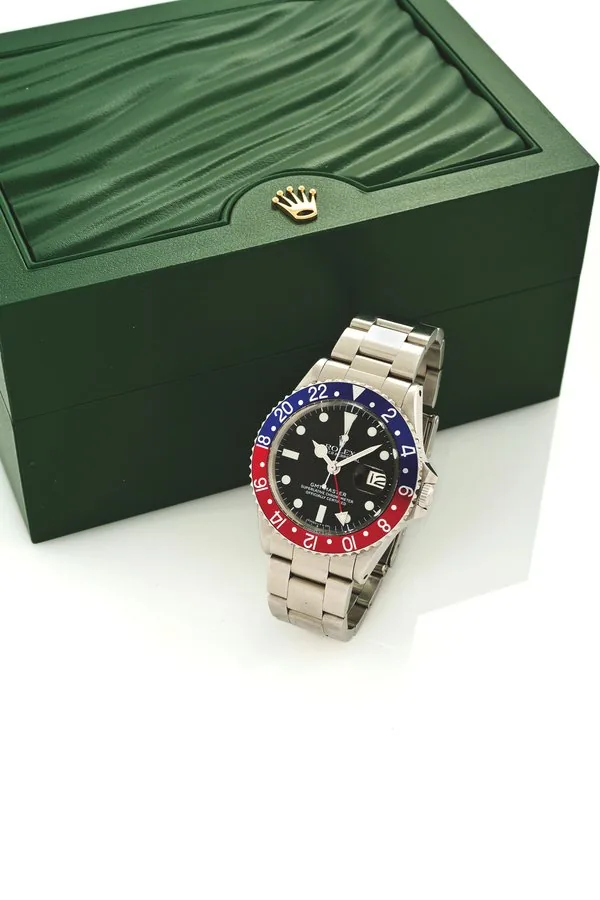 ROLEX REF. 1675 GMT MASTER STEEL Rolex Oyster Perpetual, GMT Master, Superlative Chronometer, Officially Certified, case No. 1820684, Ref. 1675. Made in 1968. Fine, two time zone, center seconds, self-winding, waterresistant, stainless steel wristwatch with date, 24-hour bezel and hand and a stainless steel Rolex Ref. 93150 Oyster bracelet. Accompanied by a Rolex fitted box.