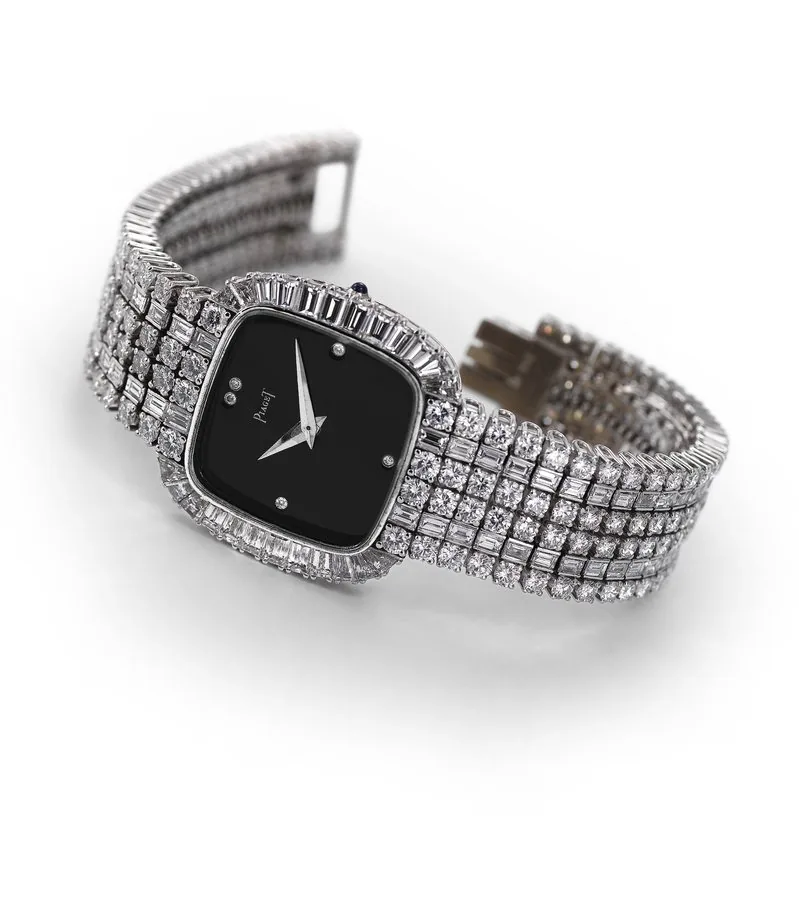 Piaget, White Gold and Diamond 'Joallerie' Piaget, 'Joallerie', movement No. 7791758. Made in the 1990's. Very fine and elegant, cushion shaped, 18K white gold and diamond wristwatch with an 18K white gold bracelet set with diamonds. To be sold without reserve