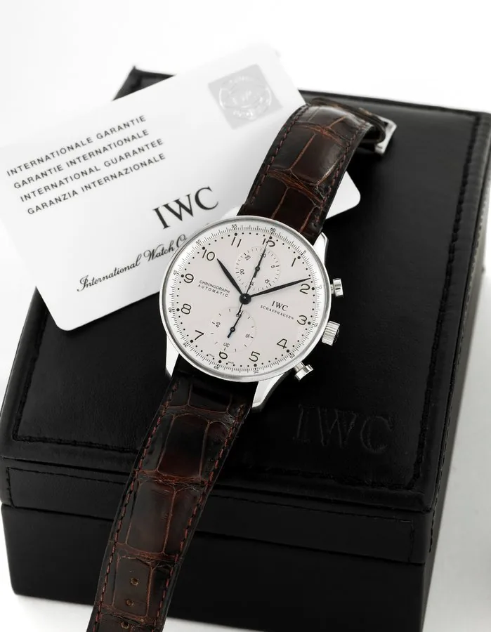 IWC - Steel - Portuguese - Chronograph International Watch Co., Schaffhausen, "Portuguese - Chronograph - Automatic,' case No. 2860748, Ref. 3714. Made circa 2007. Very fine, large, self-winding, water-resistant, stainless steel wristwatch with round button chronograph, register and a stainless steel IWC buckle. Accompanied by a box, guarantee, and instruction booklet.