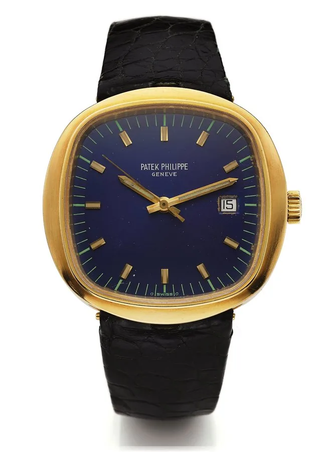 PATEK PHILIPPE REF. 3597/2 BETA 21 DETACHABLE BRACELET YELLOW GOLD Patek Philippe, Genève, No. 00006101, case No. 2720560, Ref. 3597/2. Made in 1973, sold on July 9th, 1973. Rare and unusual center second, water-resistant, large cushion-shaped, 18K yellow gold wristwatch with date. Accompanied by an Extract from the Archives.