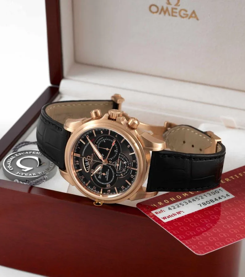 Omega Pink Gold Chronoscope GMT Co-Axial Omega, Chronoscope Co-Axial Chronometer, GMT, case No. 78084454, Ref. 42253445. Made circa 2008. Fine, water-resistant, self-winding, two time zone, 18K pink gold wristwatch with round button chronograph, registers, date and an 18K pink gold Omega deployant clasp. Accompanied by the original fitted box, chronometer certificate, guarantee and instruction manual.