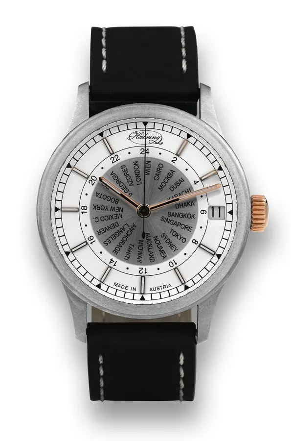 HABRING WORLD TIME DEAD SECONDS STEEL Habring, Made in Austria, 'World Timer', No. 05. Made in 2010. Fine and unusual, water resistant, dead center seconds, self-winding, world time, stainless steel wristwatch with date. Accompanied by fitted box and warranty. To be sold without reserve
