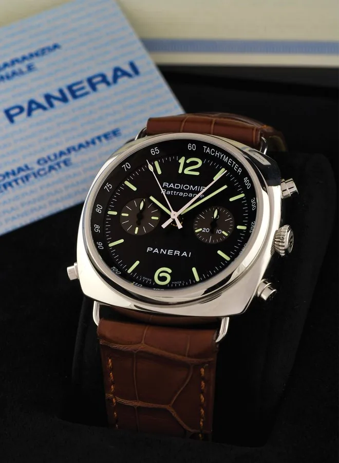 PANERAI RADIOMIR RATTRAPANTE, PAM 214 Officine Panerai, "Radiomir Rattrapante," Automatic Chronometer, No. H 0875/1000, Ref. PAM 214/OP 6642. Made in a limited edition of 1000 pieces in 2005, sold in January 2007. Very fine, large, cushion-shaped, self-winding, waterresistant, stainless steel diver's wristwatch with round button splitseconds chronograph, register, tachometer and a stainless steel Panerai double deployant clasp. Accompanied by the original fitted wooden box, Chronometer certifica