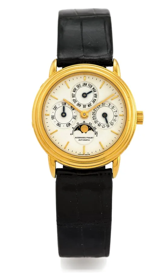 AUDEMARS PIGUET LADY'S PERPETUAL CALENDAR YELLOW GOLD Audemars Piguet, Genève, "Quantième Perpétuel Automatique," No. 156, case No. C 76040. Made in the 1990s. Very fine and rare, lady's, self-winding, 18K yellow gold wristwatch with perpetual calendar, phases and age of the moon and an 18K yellow gold Audemars Piguet buckle.