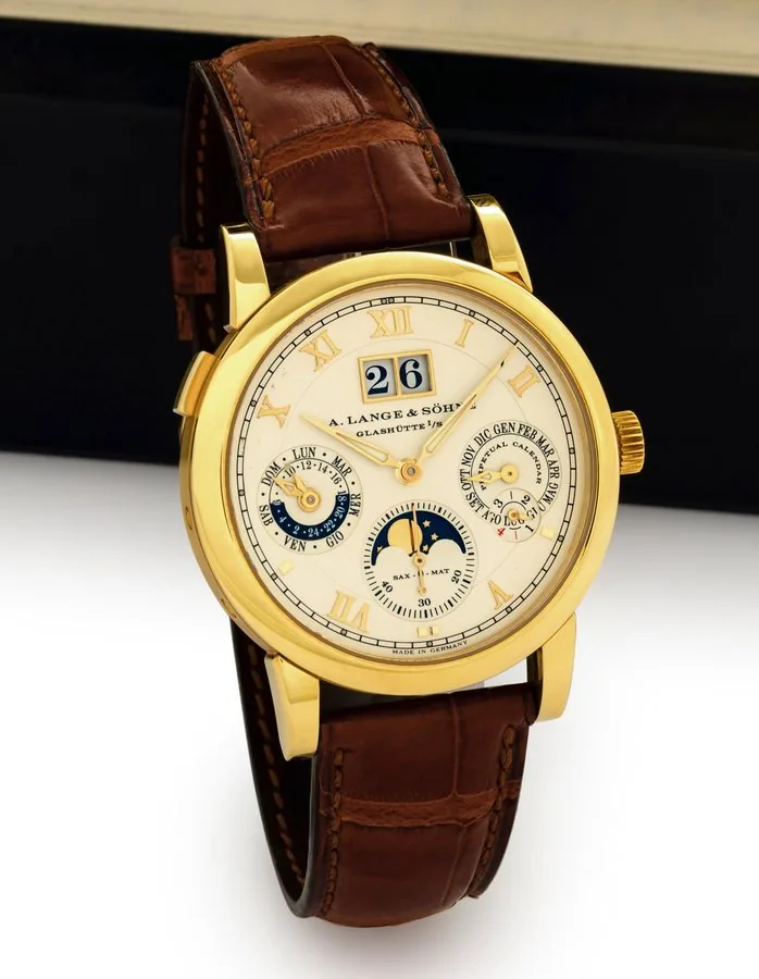 A. LANGE REF. 310.021 LANGEMATIC PERPETUAL CALENDAR YELLOW GOLD A. Lange & Söhne, Glashütte i./Sa., Langematik Perpetual, movement No. 28010, case No. 138069, Ref. 310.021. Production of this reference started in 2001. Very fine and rare, self-winding, water-resistant, 18K yellow gold wristwatch with perpetual calendar, leap year indication, oversized date, 24-hour indication, moon phases and an 18K yellow gold Lange buckle. Accompanied by a fitted box with winding facilities.