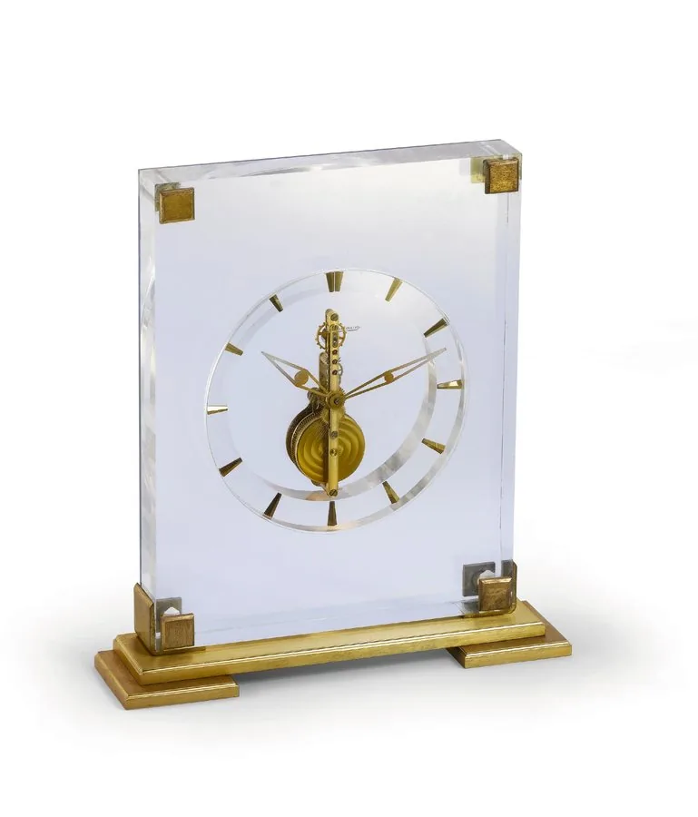 Jaeger-LeCoultre, Ref. 318, Swiss. Made circa 1960. Fine and rare, brass and Lucite, 8-day going desk clock. To be sold without reserve