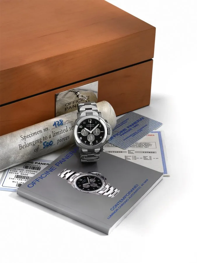 LUMINOR PANERAI PAM 52 TITANIUM & STEEL CHRONOGRAPH Officine Panerai, Firenze 1860, Luminor Automatic Chronograph, No. B 128/500, OP 6531. Made in a limited edition of 500 pieces in 1999. Fine and rare, cushion-shaped, self-winding, water resistant, titanium wristwatch with square button chronograph, registers with a titanium and stainless steel Panerai bracelet. Accompanied by fitted box, guarantee, certificate, instruction booklet, the Controle Officiel Suisse des Chronometres and 2 extra link