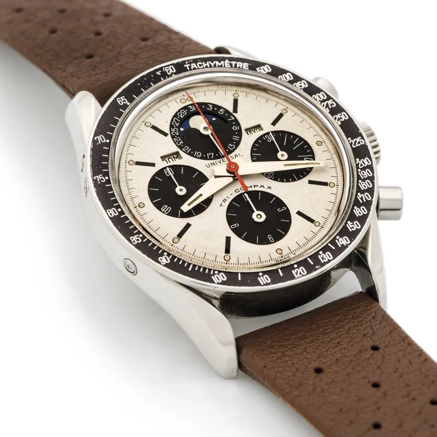 UNIVERSAL REF. 881101 TRI-COMPAX DAY-DATE PANDA DIAL STEEL Universal, Genève, "Tri-Compax", case No. 24377931, Ref. 881101/01. Made in the 1960s. Very fine, stainless steel, water-resistant, wristwatch with round button chronograph, registers, tachometer bezel, triple date and moon phases.