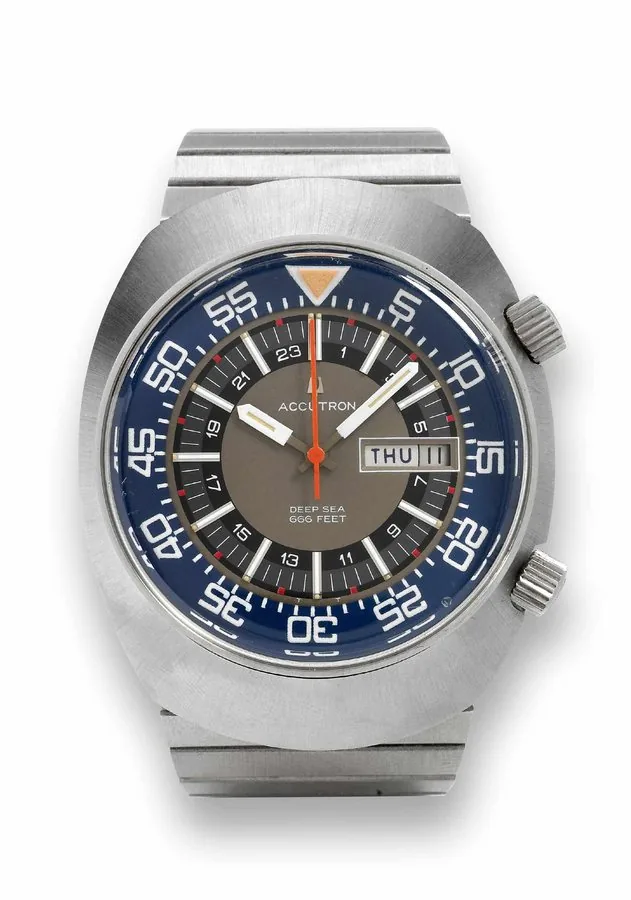 Bulova Steel - Deep Sea - Day & Date Bulova, "Accutron Deep Sea 666 Feet," No. 3-630081, N4. Made circa 1975. Fine, extremely rare, tonneau-shaped, asymmetrical, electronic, center seconds, water resistant, stainless steel diver's wristwatch with revolving inner disc, day date indication and original Accutron stainless steel link bracelet. Accompanied by a fitted box and instruction booklet.