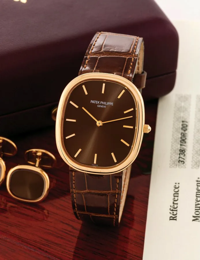 PATEK PHILIPPE REF. 3738 "ELLIPSE" PINK GOLD Patek Philippe, Genève, movement No. 5513735, case No. 4722507, Ref. 3738/100R-001. Sold on February 9th, 2010. Very fine, oval, self-winding, 18K pink gold wristwatch with an 18K pink gold Patek Philippe buckle. Accompanied by fitted box, Certificate of Origin and instruction booklet. Further accompanied by a pair of 18k pink gold Patek Philippe cufflinks and original fitted box.