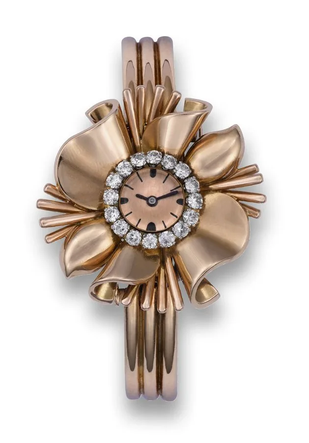 Mido, No. 17956, Retailed by Fontana. Manufactured in the 1950's. Fine and unusual, flower-shaped, 18K pink gold and diamond lady's convertible brooch/bracelet watch.