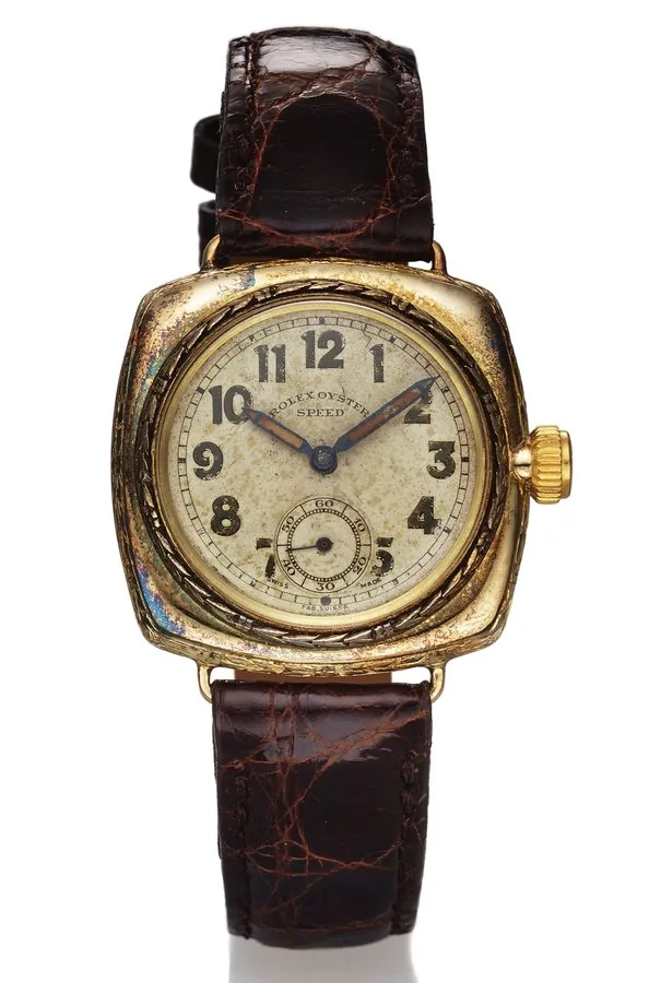 ROLEX EXTRA PRIMA YELLOW GOLD Rolex, "Oyster, Speed," case No. 20983. Made in 1931. Fine and rare, cushion-shaped, water-resistant, 14K yellow gold wristwatch.