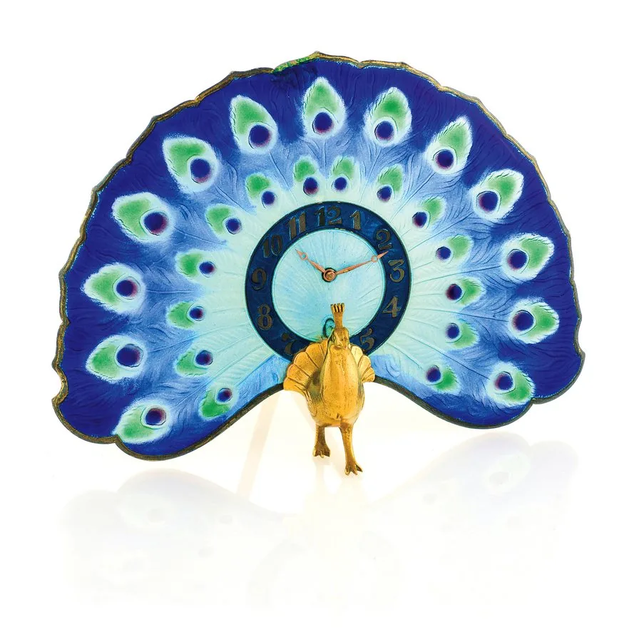 THE PEACOCK - SILVER & ENAMEL DESK CLOCK YOCS, Swiss. Made circa 1910. Fine and unusual, silver-gilt, gilt-metal and enamel desk clock in the form of a peacock.