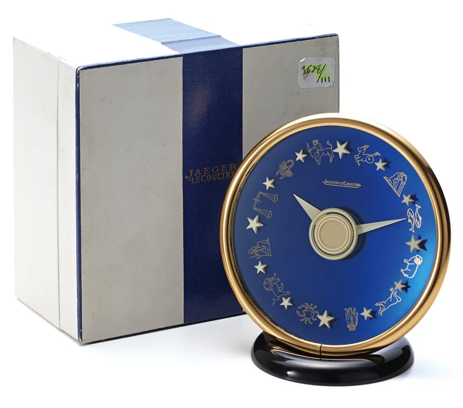 JAEGER LECOULTRE ZODIAC DESK CLOCK Jaeger-LeCoultre Zodiac Clock Jaeger-LeCoultre, No. 15921. Made circa 1960s. Fine and unusual, gilt brass, desk clock decorated with the signs of the Zodiac. Accompanied by the original fitted box.