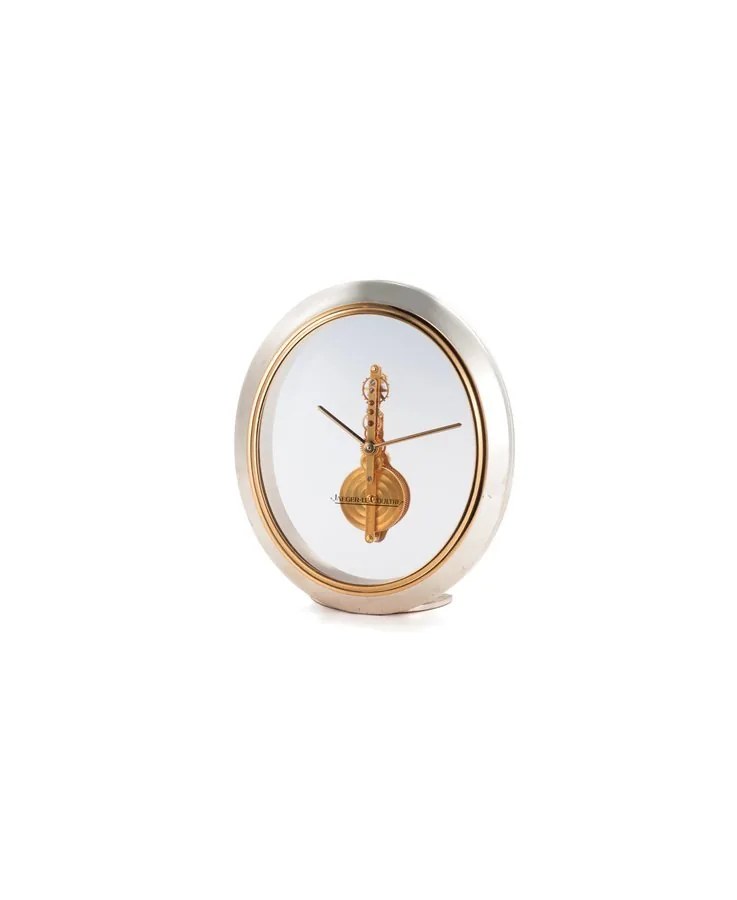 JAEGER LECOULTRE REF. 556 DESK CLOCK Jaeger-Le Coultre, Swiss, N o. 556, circa 1960. Fine, gilt brass eight-day going skeletonized desk clock