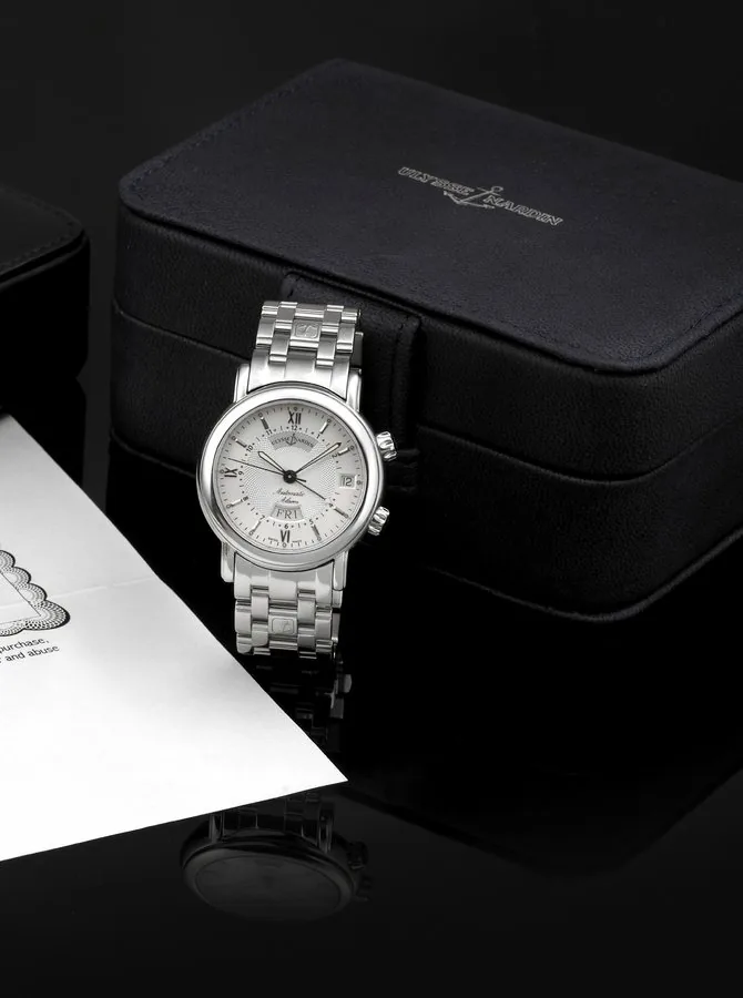 ULYSSE NARDIN REF. 603-77 SAN MARCO ALARM STEEL Ulysse Nardin, San Marco Alarm, Automatic, case No. 928, Ref. 603.77. Fine, self-winding, center seconds, two crowns, stainless steel wristwatch with alarm, day/date and a stainless steel Ulysse Nardin link bracelet with concealed double deployant clasp. Accompanied by original fitted box, booklet, service receipt, and 3 extra links.