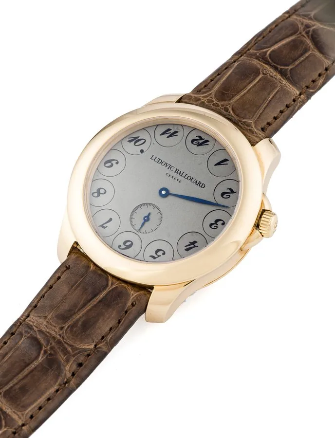 LUDOVIC BALLOUARD UPSIDE DOWN RED GOLD [NEW OLD STOCK] Very fine and unusual, manual-winding, 18K red gold wristwatch.