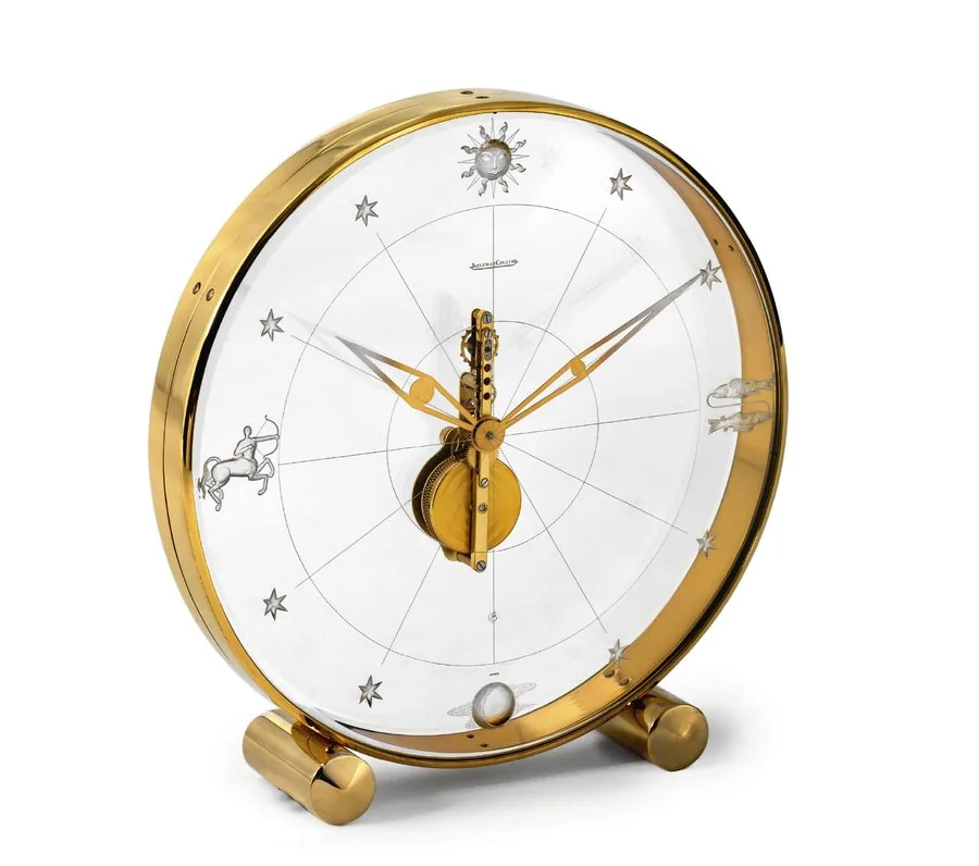 JAEGER LECOULTRE REF. 335 "ZODIAC" Jaeger-LeCoultre, 'Horologerie DeLuxe,' Ref. 335. Made in the 1960's. Fine, Perspex and gilt brass, 8-day going desk clock with visible movement. To be sold without reserve