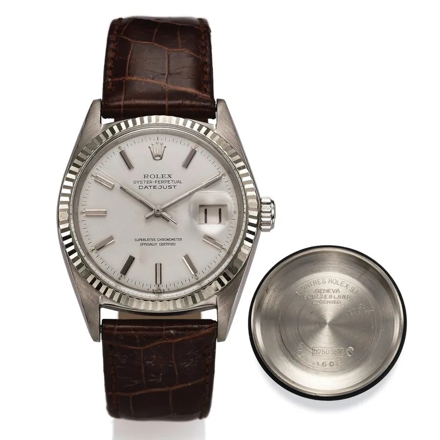 ROLEX REF. 1601 DATEJUST WHITE GOLD Rolex, "Oyster Perpetual Datejust, Superlative Chronometer, Officially Certified," case No. 1569615, Ref. 1601. Made in 1965. Fine, center seconds, self-winding, water-resistant, white gold Chronometer wristwatch with date and a stainless steel Rolex buckle.