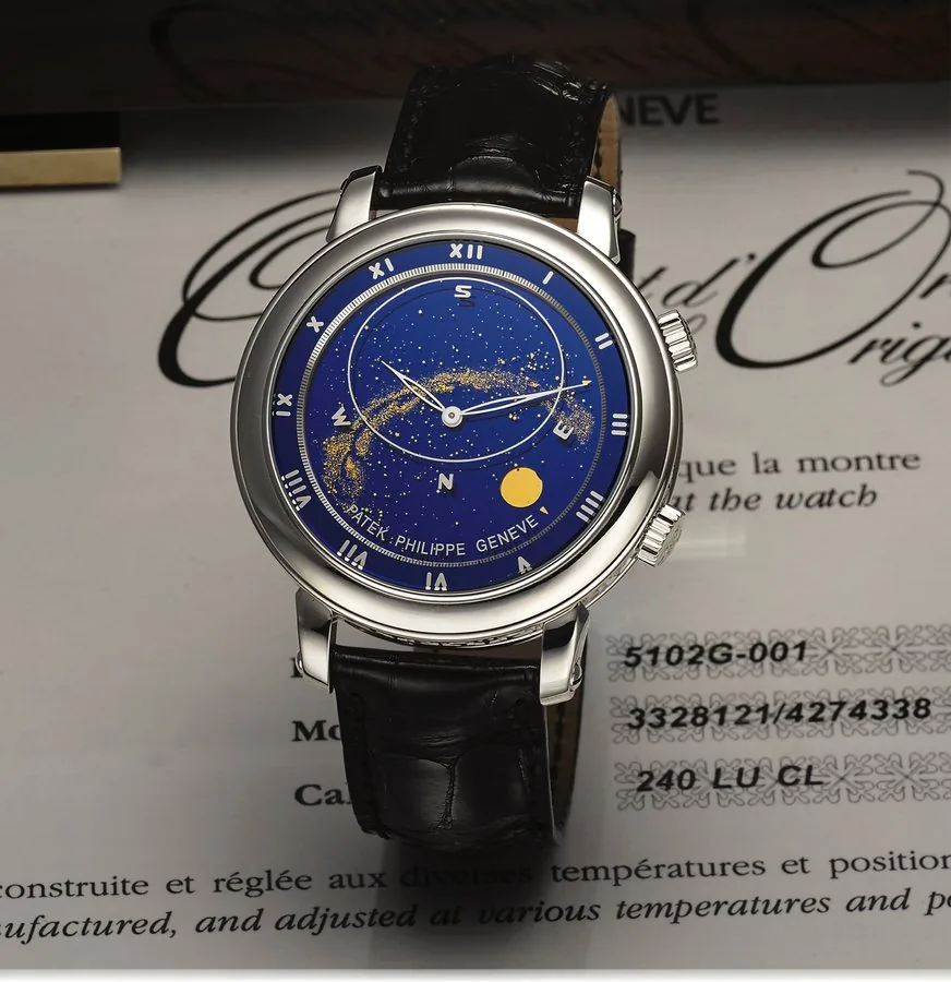 PATEK PHILIPPE REF. 5102 CELESTIAL WHITE GOLD Patek Philippe, Genève, "The Celestial Wristwatch," movement No. 3328121, case No. 4274338, Ref. 5102G. Made in 2006, sold August 27th, 2007. Extremely fine, rare and unusual, astronomic, self-winding, 18K white gold wristwatch with mean time indication, nocturnal sky chart of the Northern Hemisphere, moon phases and moon orbit, time of the meridian passage of Sirius and moon with an 18K white gold Patek Philippe buckle. Accompanied by the original f