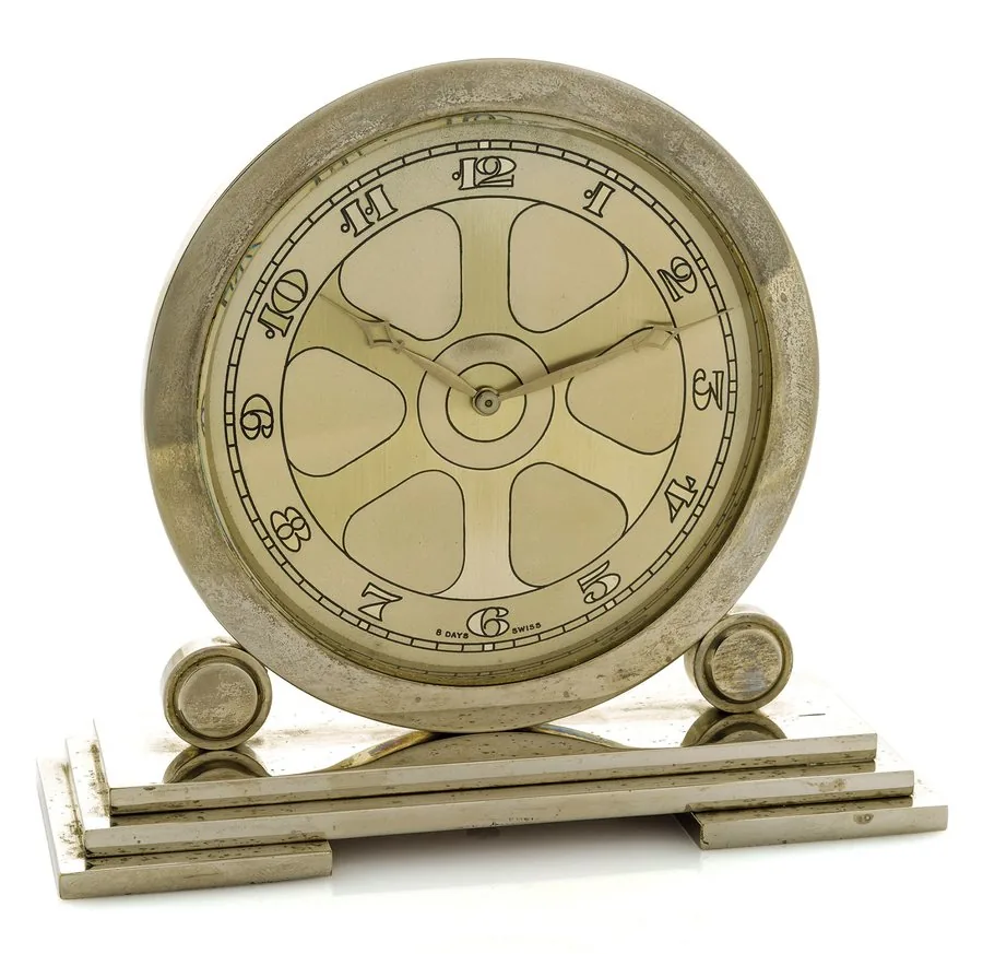 ART DECO CLOCK "AUTOMOBILE WHEEL" Swiss, "8-Days", Swiss. Made circa 1930. Fine and rare, 8-day going, chromed Art Deco desk clock.