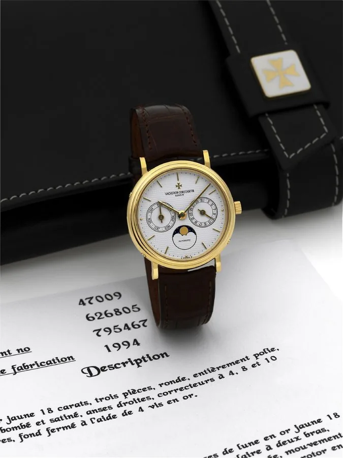 VACHERON & CONSTANTIN DAY-DATE MOON PHASE Vacheron & Constantin, Geneve, N° 795467, case No. 626805, Ref. 47009. Made in 1994. Fine, self-winding, water-resistant, 18K yellow gold wristwatch with dual date, moon phases and an 18K yellow gold Vacheron Constantin buckle. Accompanied by a Vacheron & Constantin box and certificate of authenticity.