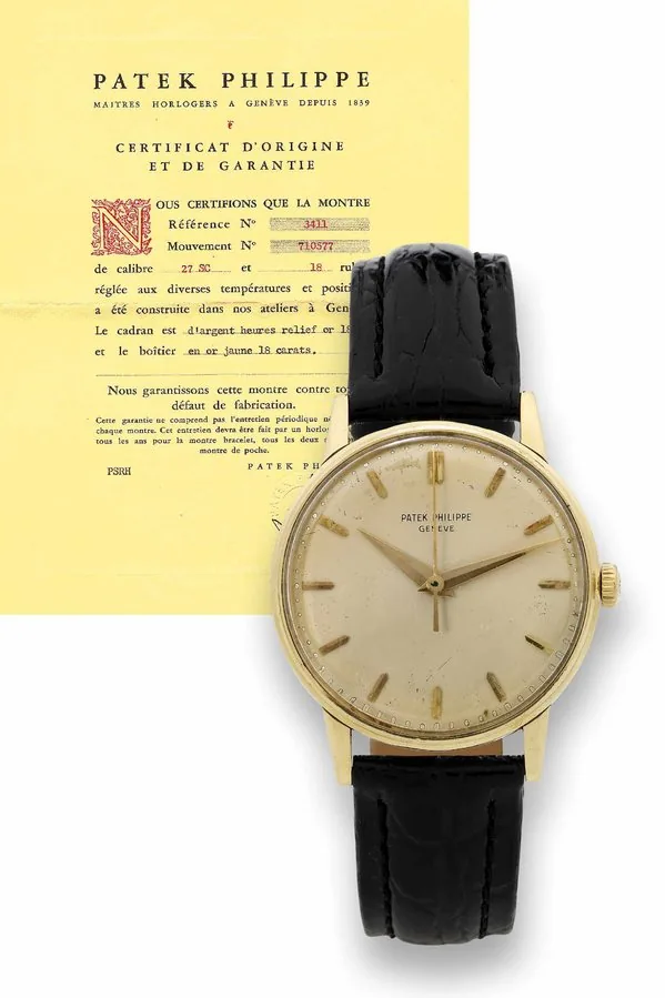 Patek Philippe Ref. 3411 Yellow Gold Patek Philippe, Genève, No. 710577, case No. 2642684, Ref. 3411. Made in 1961. Fine and rare, center seconds, 18K yellow gold wristwatch. Accompanied by the Certificate of Origin and booklet.
