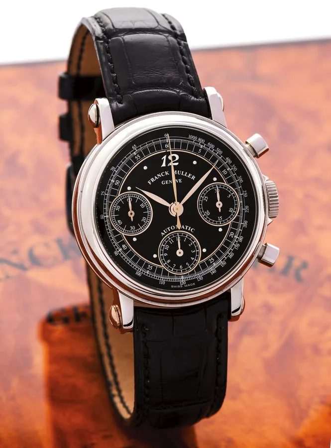 FRANCK MULLER STEEL CHRONOGRAPH - BLACK DIAL Franck Muller, Geneve, Master of Complications, "Chronograph Automatic", No. 47, Ref. 7000 CC 36. Made in the 2000s. Very fine, stainless steel, self-winding wristwatch with round-button chronograph, registers, tachometer and a stainless steel Franck Muller buckle. Accompanied by a Franck Muller fitted box and Certificate (blank).