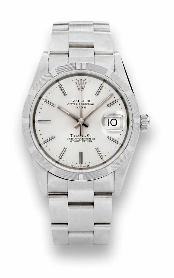 Rolex Ref. 15210 Steel Date ' Retailed by Tiffany & Co. Rolex 'Oyster Perpetual, Date, Superlative Chronometer Officially Certified,' Ref. 15210. Made in 1992. Fine, center seconds, self-winding, water-resistant, stainless steel chronometer wristwatch with date and a stainless steel Rolex Oyster bracelet. To be sold without reserve