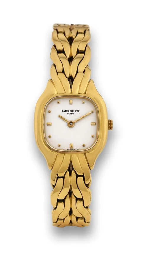 PATEK PHILIPPE REF. 4715 LADY'S QUARTZ Patek Philippe, Genève, No. 1601977, case No. 2834899, Ref. 4715/1. Made in the 1980s. Very fine, cushion-shaped, 18K yellow gold lady's quartz wristwatch with an integrated twisted 18K yellow gold Patek Philippe bracelet. Accompanied by an extra link.