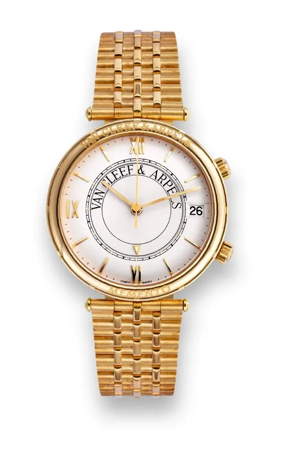Van Cleef & Arpels, Paris, "Memento" , Ref. 123003, No. 48, case No. 63923, movement No. 2439216, Made in the 1990s. Very fine and unusual, center second, 18K yellow gold wristwatch with date, alarm and two crowns, 18K yellow gold Van Cleef & Arpels bracelet with 18K white gold deployant clasp. Accompanied by a fitted box.