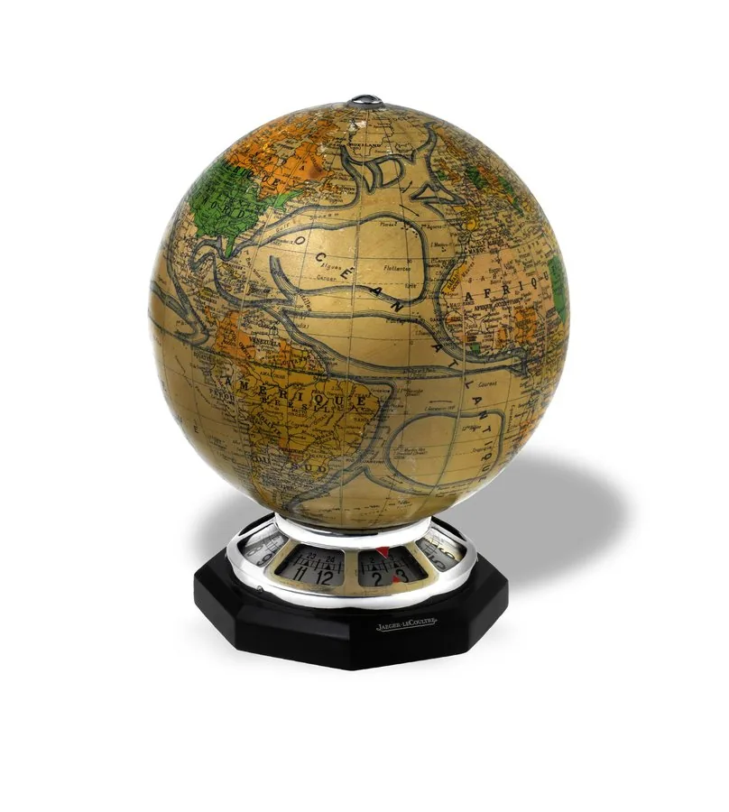 JAEGER REF. 163 ILLUMINATED WORLD GLOBE TABLE CLOCK Jaeger, "Mappemonde", Ref. 163, the globe gores by J. Forest, 17-19, Rue de Buci, Paris. Made circa 1935. Fine and very rare, glass, chrome and black marble, 8-day going Art Deco table clock with electric illuminated terrestrial globe. To be sold without reserve