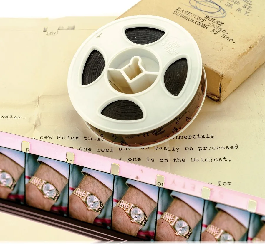 ROLEX ADVERTISING 16mm.FILM FOR THE DATEJUST AND THE SUBMARINER Rolex promotional advertising movie on Super 11 film. Made circa 1965. Accompanied by a DVD re-transcription of the film as well as a Rolex letter to the Jeweler that ordered it. Featuring two clips lasting 55 seconds each promoting the Datejust and the Submariner. The accompanying Rolex letter states: Here are the two new Rolex 55-second color TV commercials you ordered. Both are on one reel and can easily be processed by your loca