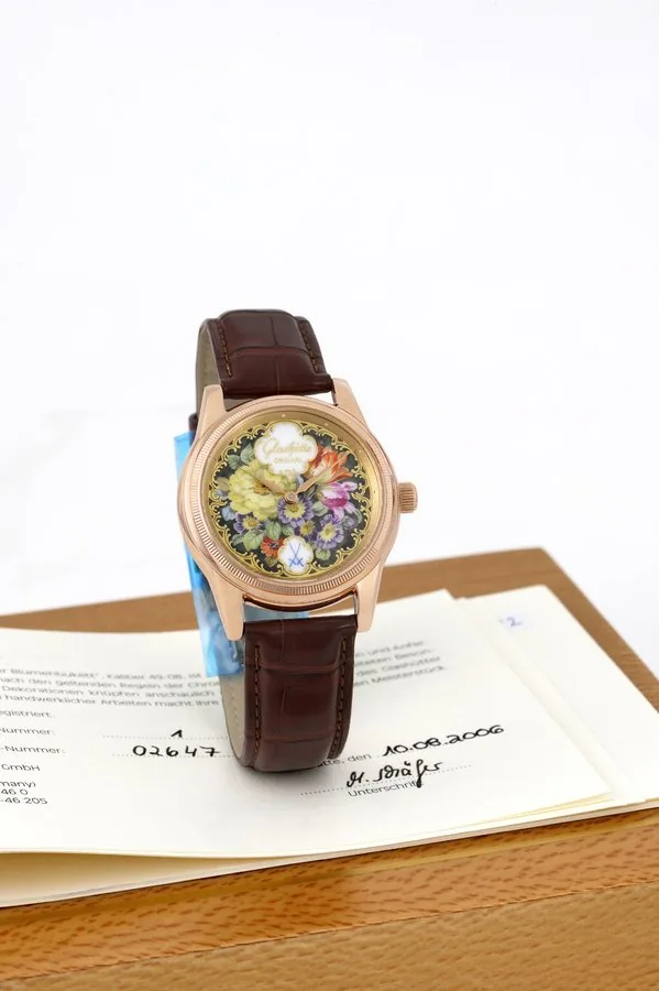 Glashütte No. 1, flower bouquet Glashütte Original, 'Meissen Porcelain Dial', movement No. 02647, No. 1/2. Made in only 2 examples, sold on August 10th, 2006. Very fine and extremely rare, water-resistant 18K pink gold wristwatch with a Meissen porcelain dial and an 18K pink gold Glashutte double deployant clasp. Accompanied by certificate and booklet.