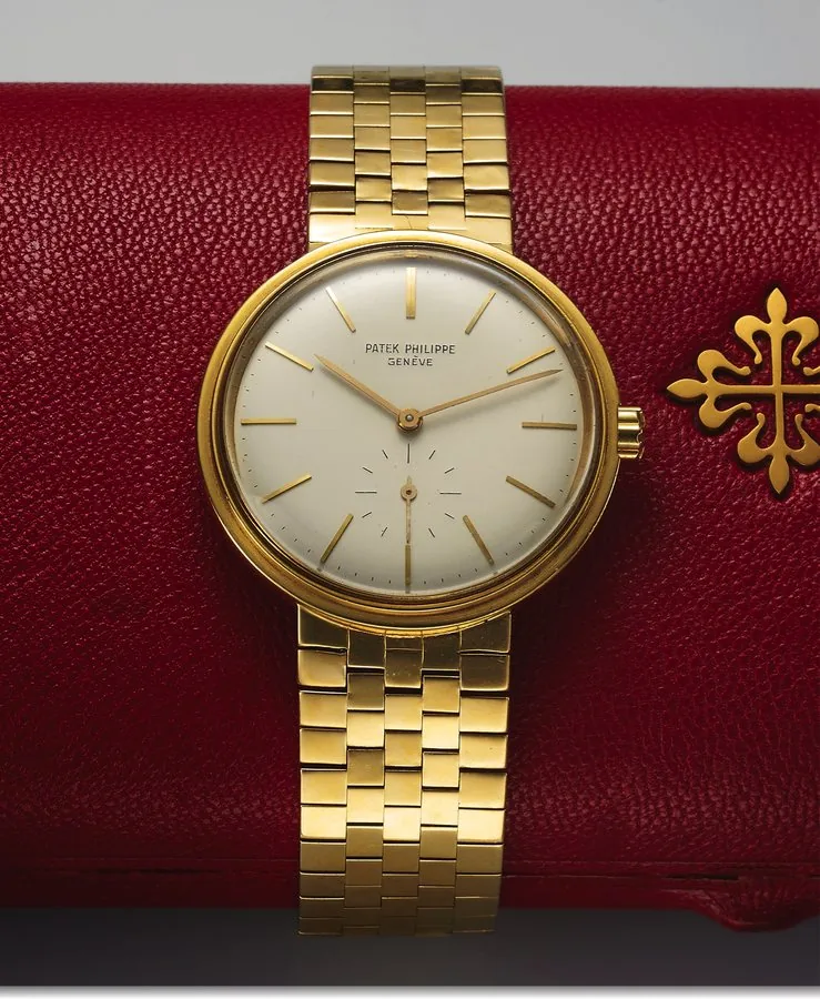 PATEK PHILIPPE REF. 3429 YELLOW GOLD Patek Philippe, Genève, Especially Made for His Excellency Henry J. Taylor, American Ambassador to Switzerland circa 1962, movement No. 1110116, case No. 2614575, Ref. 3429. Very fine and rare, self-winding, water-resistant, 18K yellow gold wristwatch with an integral 18K yellow gold brick link bracelet. Accompanied by a fitted box.