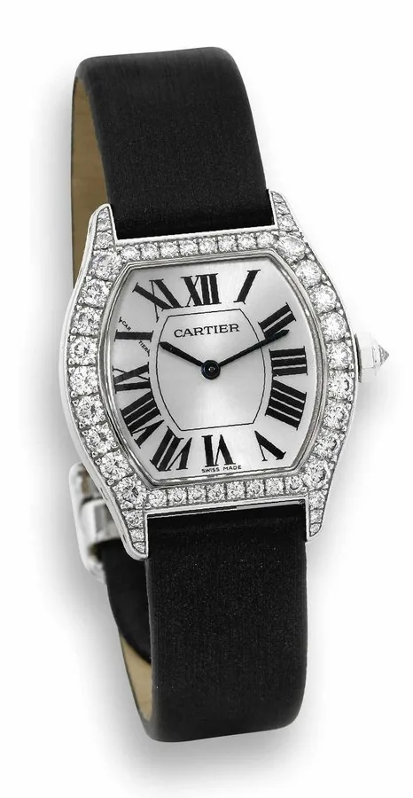 Cartier Tortue, Collection Privée Cartier 'Tortue,' No. 100623 LX , Ref. 2644. Made circa 2005. Fine, tonneau-shaped, water-resistant, 18K white gold and diamonds wristwatch with an 18K white gold Cartier deployant clasp. To be sold without reserve