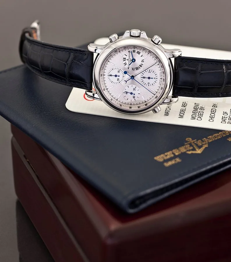 ULYSSE NARDIN, REF. 573-22, 'SPLIT - CHRONO BERLIN 1907' Ulysse Nardin, No. 499, Ref. No. 573-22. Sold on January 28th, 1995. Very fine, self-winding, water-resistant, stainless steel wristwatch with round button split-seconds chronograph, registers, tachometer and stainless steel Ulysse Nardin buckle. Accompanied by fitted box, certificate, hang tag and instruction booklet.