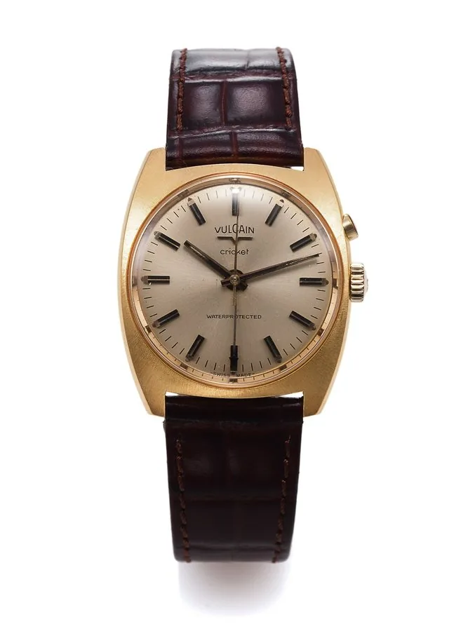VULCAIN REF. S 2311 B CRICKET GOLD PLATED Vulcain, La Chaux-de-Fonds, "Cricket"Ref. S 2311 B. Production of this model started in 1948. Fine, tonneau-shaped, center-seconds, water-resistant, gold plated wristwatch with alarm.