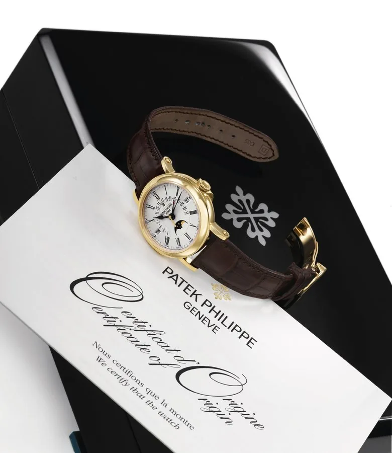 PATEK PHILIPPE REF. 5159 RETROGRADE PERPETUAL CALENDAR Patek Philippe, Genève, movement No. 3720358, case No. 4444563, Ref. 5159J. Sold on October, 2008. Very fine, Officer-style, center seconds, self-winding, water resistant, 18K yellow gold wristwatch with perpetual calendar, moon phases, retrograde date, and an 18K yellow gold Patek Philippe deployant clasp. Accompanied by a Patek Philippe box, certificate, and booklet.