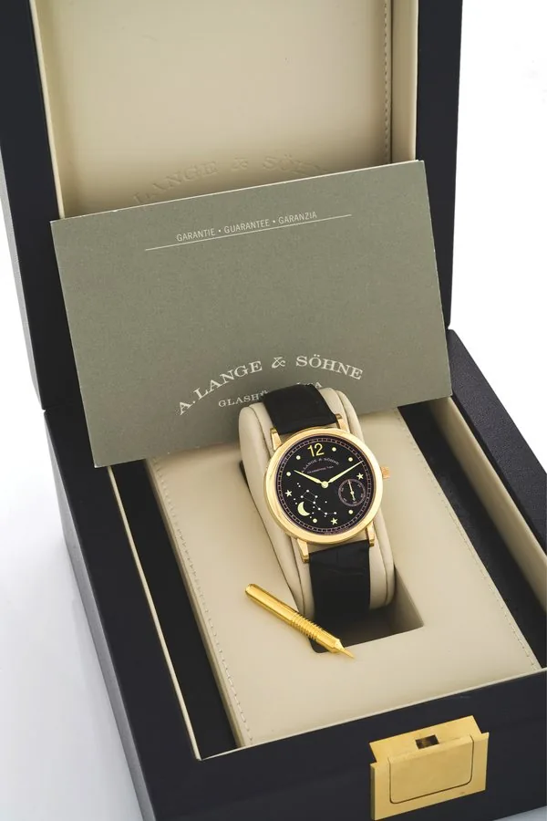 LANGE & SOHNE 1815 - EMIL LANGE - MOON PHASE A. Lange & Söhne, Glashütte i. SA, '1815 - Emil Lange - Moon Phase', No. 113/250, movement No. 14158, case No. 124113, Ref. 231.031. Made in a limited edition of 250 examples in 2000, sold in October 2000. Very fine and rare, astronomic, water-resistant, 18K pink gold wristwatch with moon phases and an 18K pink gold A. Lange & Söhne buckle. Accompanied by a Lange & Söhne fitted box, Certificate, instruction manual and gold push pin.