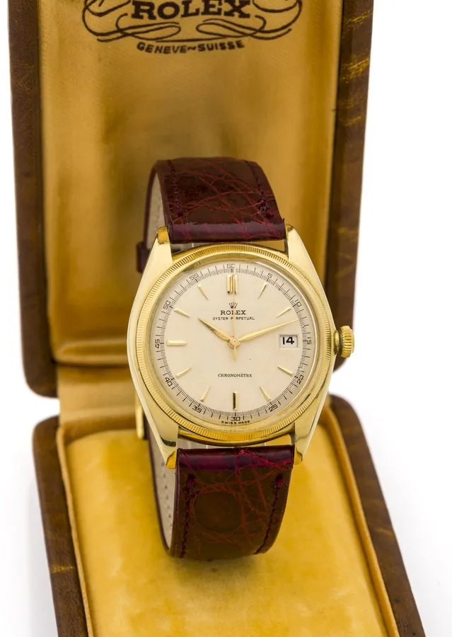 ROLEX REF. 4467, OYSTER PERPETUAL - SO-CALLED "OVETONE" Rolex, "Oyster Perpetual, Officially Certified Chronometer", case No. 460473, Ref. 4467. Made in the late 1940s. Very fine and rare, center-seconds, self-winding, water-resistant, tonneau-shaped, 18K yellow gold wristwatch with date.