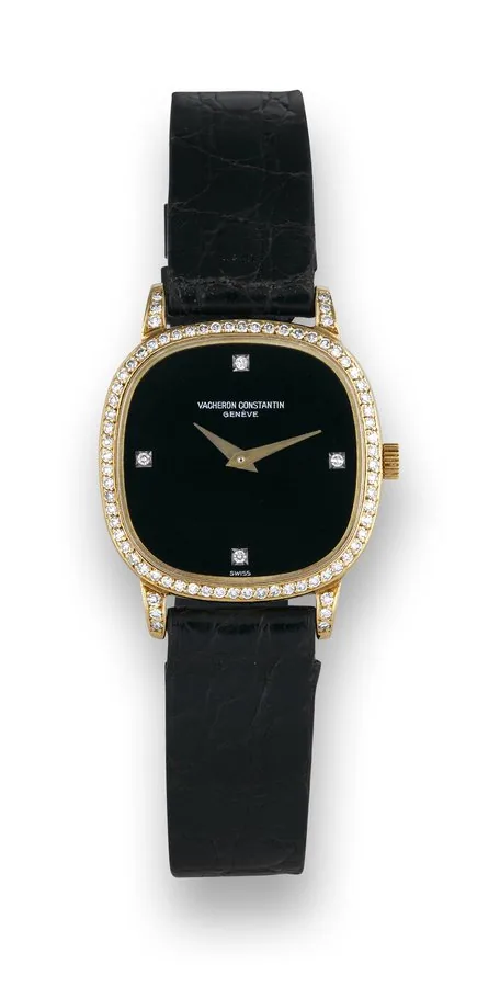 Vacheron Constantin Lady's Yellow Gold & Diamonds Vacheron Constantin, Genève, movement No. 687545, case No. 517996, Ref. 13004 P. Made in the 1990s. Fine, cushion-shaped, 18K yellow gold and diamond-set lady's wristwatch with black onyx diamond-set dial and an 18K yellow gold buckle. Accompanied by a Vacheron Constantin fitted box.