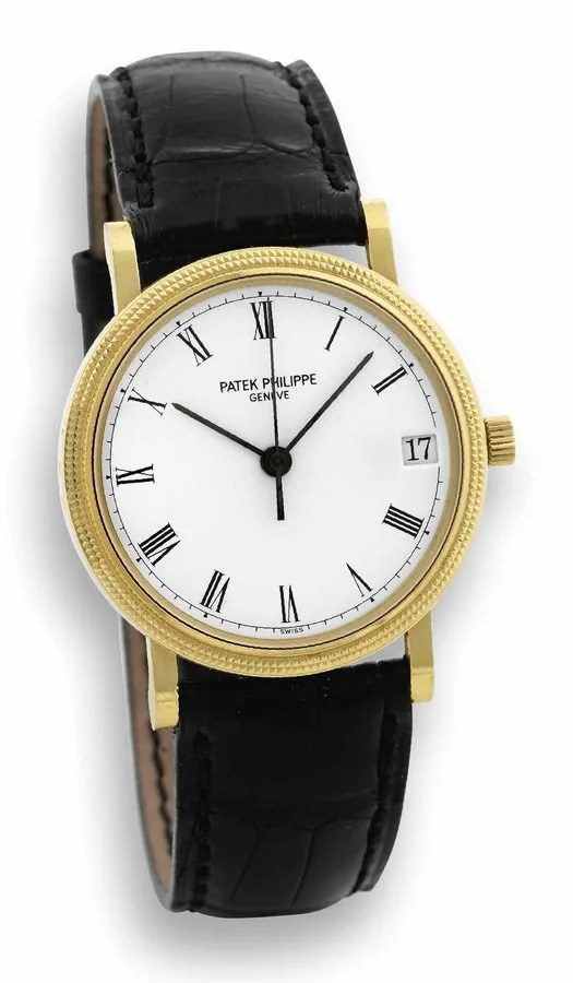 Patek Philippe, Genève, movement No. 3002460, case No. 2990017, Ref. 3802/200. Made circa 2000. Fine, center-seconds, self-winding, 18K yellow gold wristwatch with date and 18K yellow gold Patek Philippe buckle.