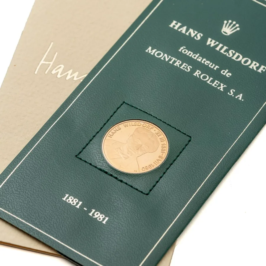 ROLEX, HANS WILSDORF BOOK AND GOLD COMMEMORATIVE COIN