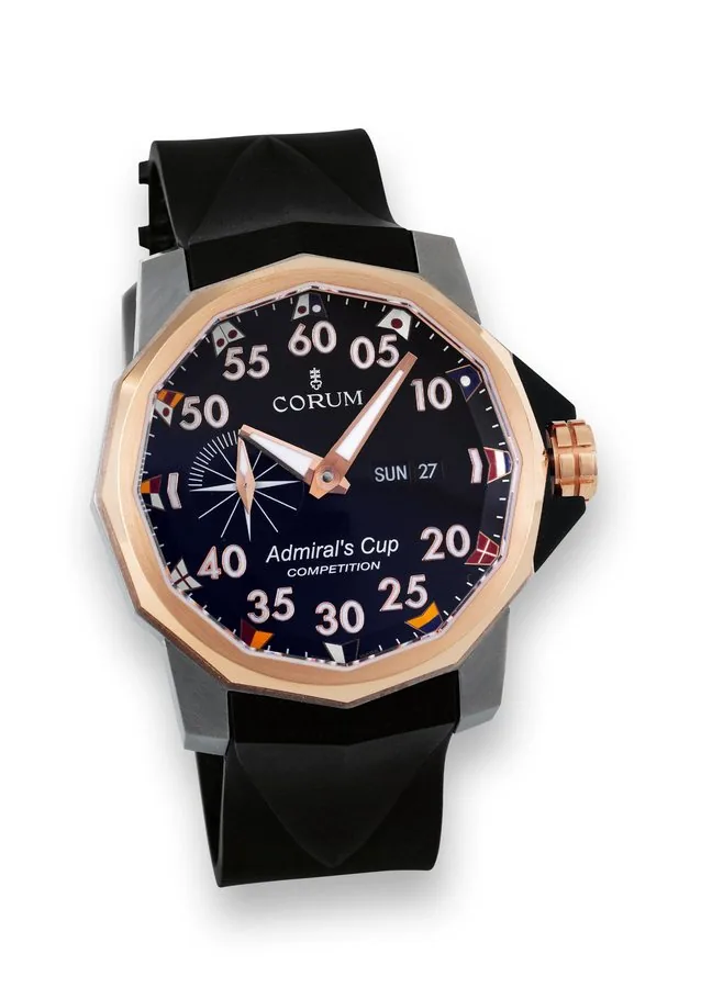 Corum Admiral's Cup Competition Corum, 'Admiral's Cup Competition', case No. 2105923, Ref. 01.0002. Made circa 2007. Fine, large, water-resistant, self-winding, dodecagonal, titanium and 18K white and pink gold chronometer wristwatch with day and date and a titanium Corum oversized buckle. Accompanied by fitted box, user manual and certificates.