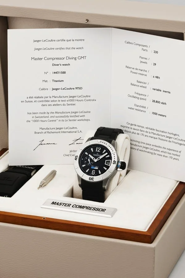 JAEGER LECOULTRE, REF. 160.T.05, MASTER COMPRESSOR DIVING GMT LIMITED Jaeger-LeCoultre, "Master Compressor Diving Gmt", No. 1447/1500, case no. 2464571, ref. 160.T.05. Made in a limited edition of 1500 pieces, sold on August 24th, 2010. Very fine, large, two time zone, center seconds, self-winding, water-resistant, titanium wristwatch with date, working indication and a titanium bracelet with deployant clasp. Accompanied by a fitted box, certificate and instruction manual and an extra Nylon stra