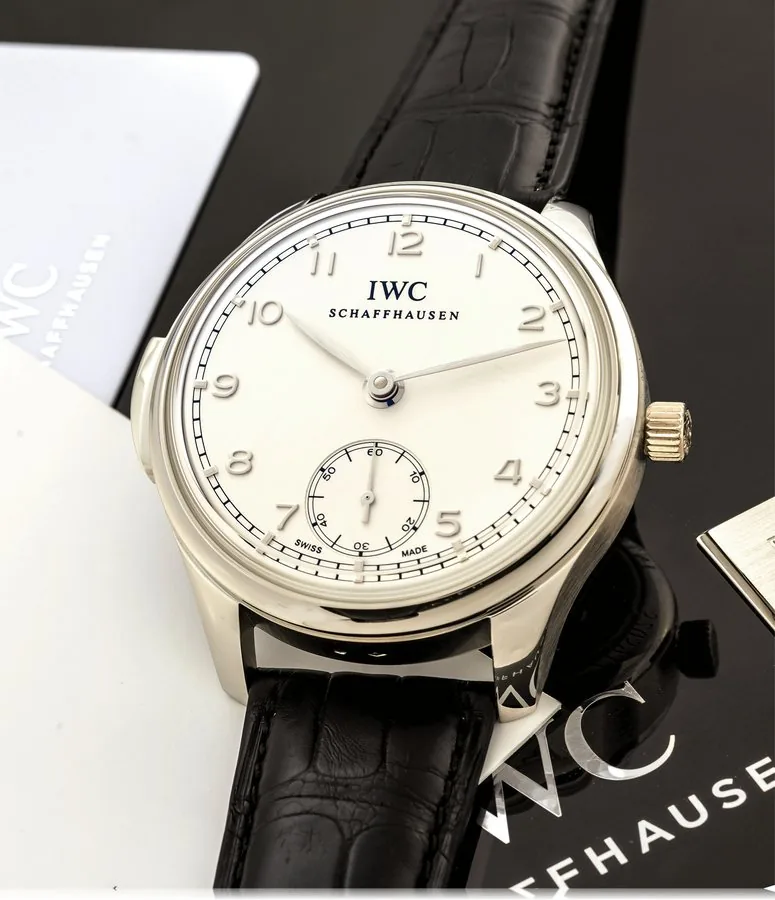 IWC REF. 544906 PORTUGUESE MINUTE REPEATER NO. 330/500 PLATINUM International Watch Co., Schaffhausen, Portuguese - Répétition Minutes, No. 330/500, case No. 5205912, Ref. 544906. Made in a limited edition of 500 pieces in 2014. Very fine and rare, large, minute-repeating, platinum wristwatch with a platinum IWC buckle. Accompanied by the original box, warranty, instruction booklet.